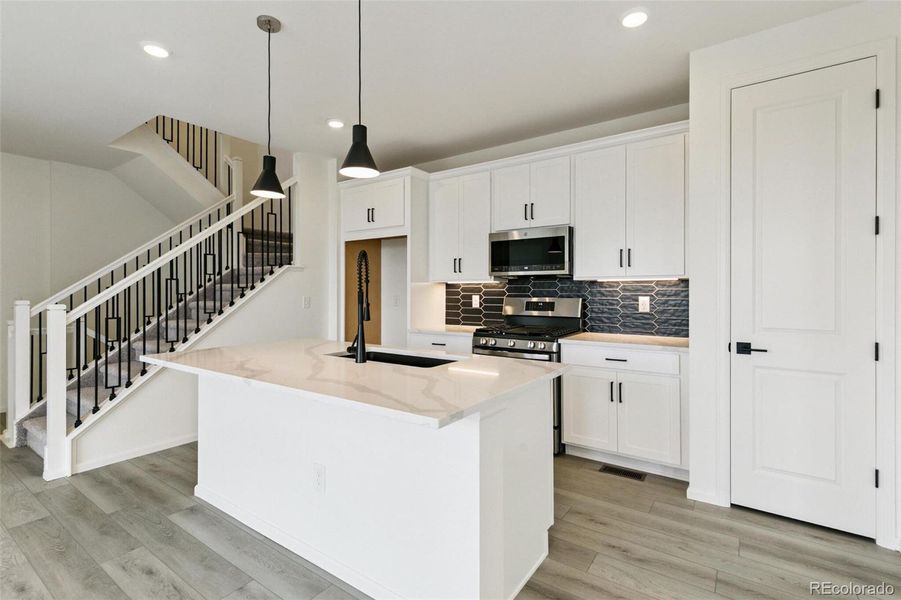 Furnished interior view inside a new home in Painted Prairie Villas, Aurora (Image 3).