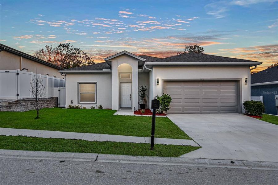Front exterior of a new home in , New Port Richey, FL, highlighting curb appeal (Image 26).