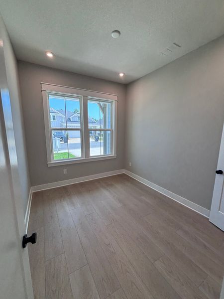Spacious, unfurnished interior of a new home in The Villas at Longleaf Park, a Watersound Origins® community, Inlet Beach (Image 6). Spacious, unfurnished interior of a new home in The Villas at Longleaf Park, a Watersound Origins® community, Inlet Beach (Image 6).
