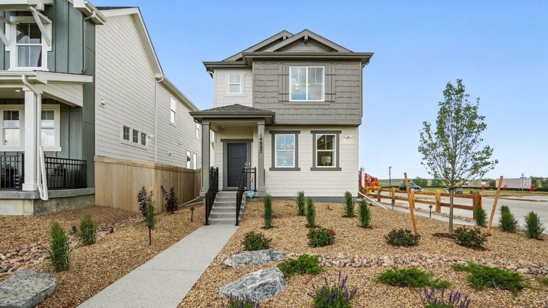 Representative exterior photo of a completed home built from the Aurora by Taylor Morrison in Parterre Horizon Collection, Thornton, CO (Image 1).
