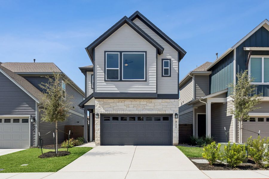 Front exterior of a new home in Double Creek Crossing – City Home Series, Round Rock, TX, highlighting curb appeal (Image 1). Front exterior of a new home in Double Creek Crossing – City Home Series, Round Rock, TX, highlighting curb appeal (Image 1).