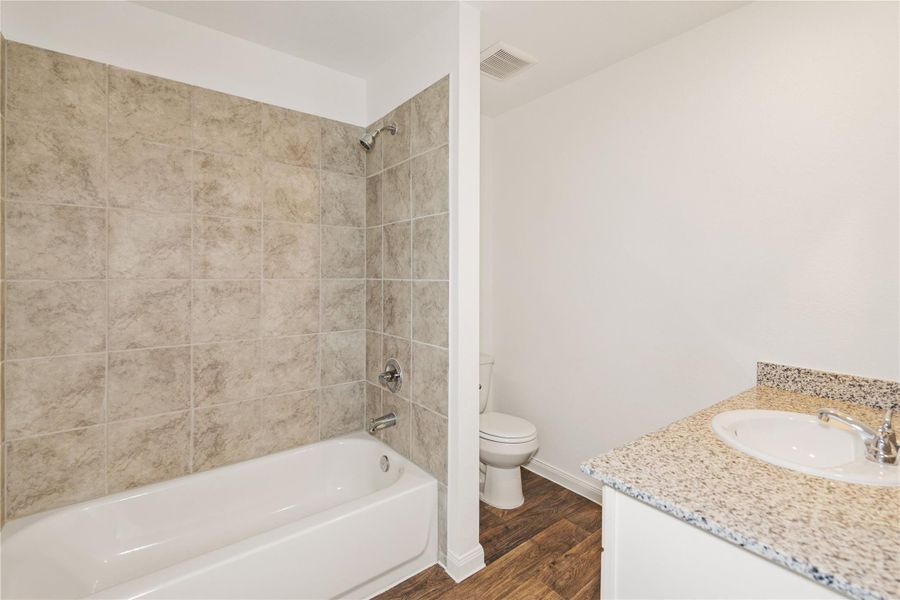 Furnished interior view inside a new home in Marie Village, Conroe (Image 4).