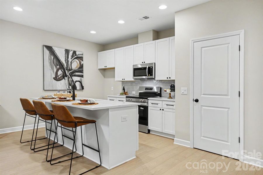 Furnished interior view inside a new home in , Monroe (Image 10).