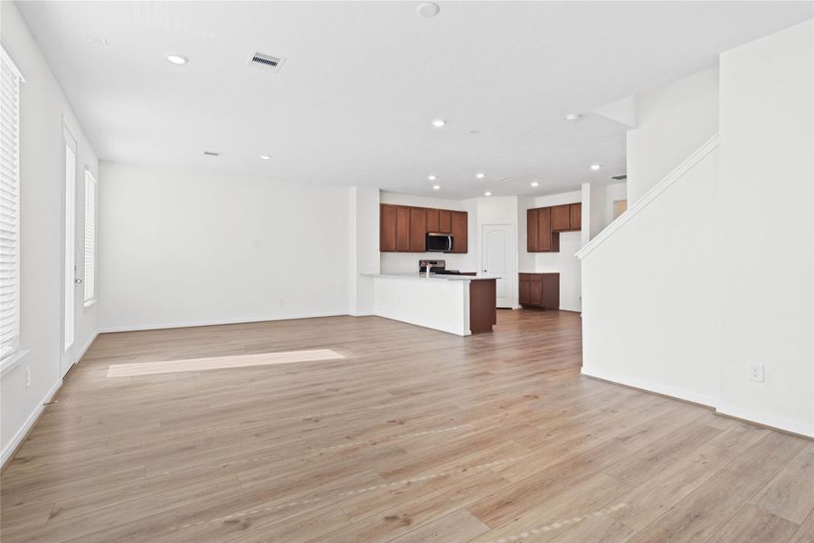 Open-concept design seamlessly connecting the living, dining, and kitchen areas—perfect for both everyday living and entertaining! Open-concept design seamlessly connecting the living, dining, and kitchen areas—perfect for both everyday living and entertaining!