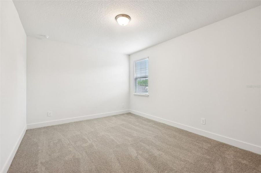 Spacious, unfurnished interior of a new home in Ridgehaven - Signature Series, Ormond Beach (Image 48).