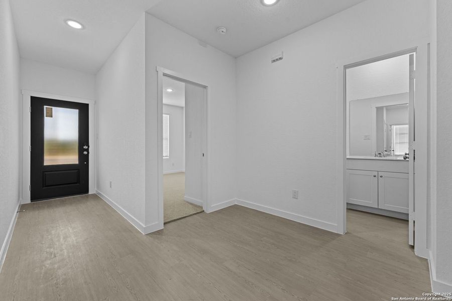 Spacious, unfurnished interior of a new home in Waterwheel: Coastline Collection, San Antonio (Image 12).