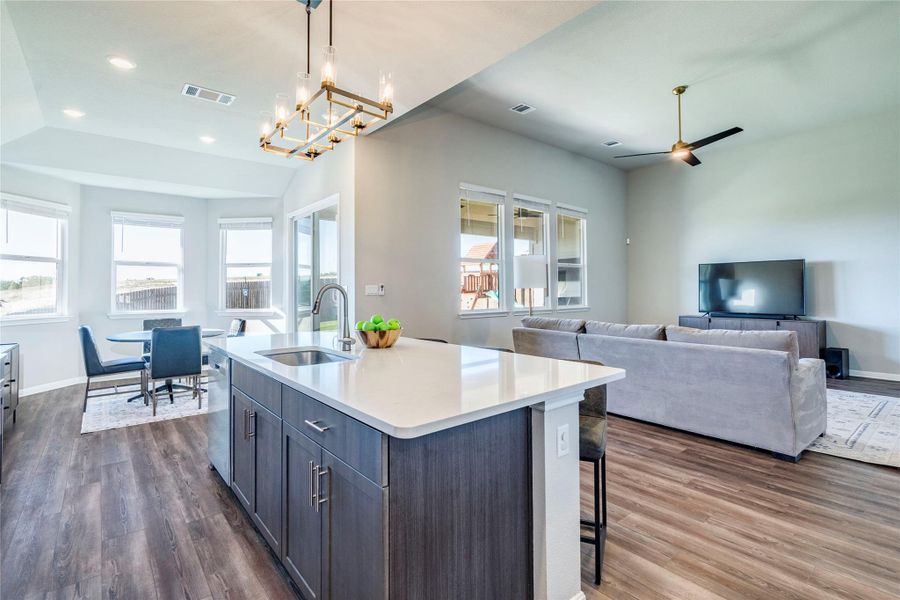 Open living with eat in kitchen.