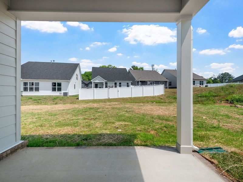 Exterior details and patio area of a home in Woods Crossing, Gallatin (Image 30).