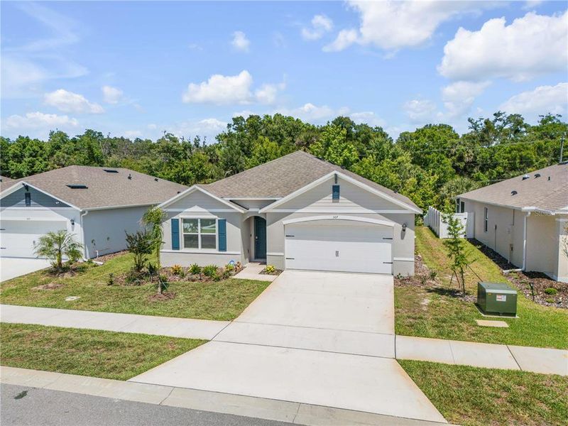 Front exterior of a new home in , New Smyrna Beach, FL, highlighting curb appeal (Image 28).