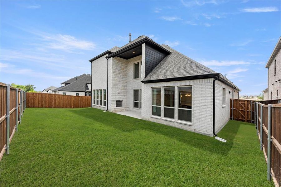 Exterior details and patio area of a home in Gideon Grove, Phase 2, Rockwall (Image 4). Exterior details and patio area of a home in Gideon Grove, Phase 2, Rockwall (Image 4).