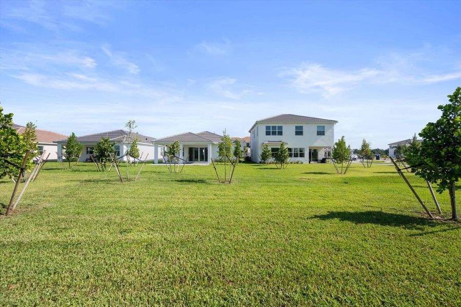 Front exterior of a new home in , Westlake, FL, highlighting curb appeal (Image 27). Front exterior of a new home in , Westlake, FL, highlighting curb appeal (Image 27).