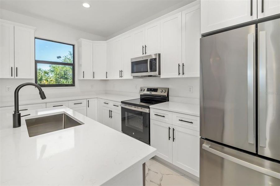 Furnished interior view inside a new home in , Port Charlotte (Image 8).