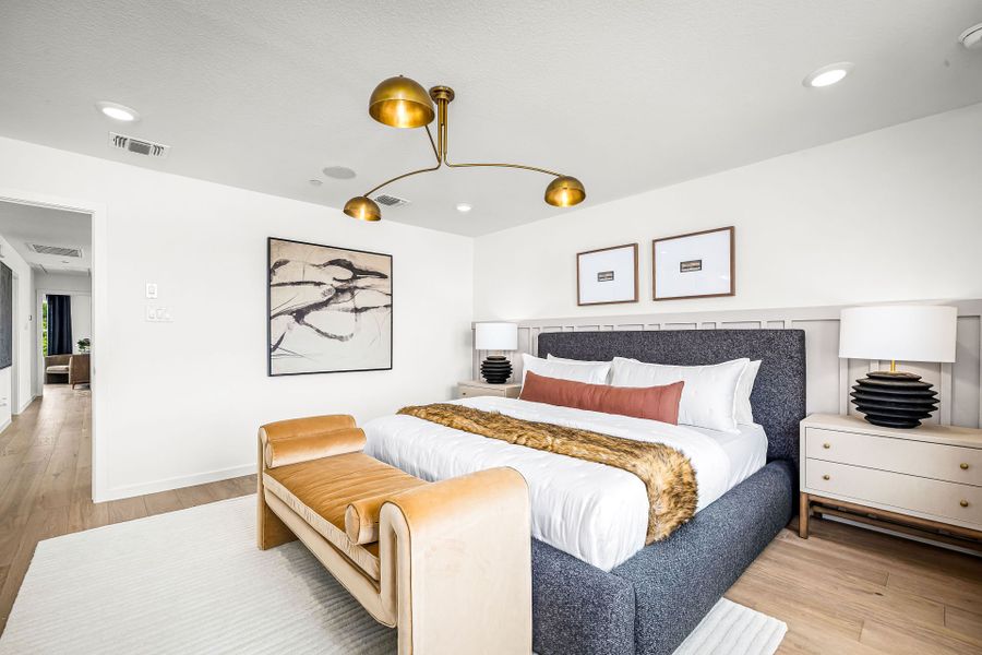 Representative furnished interior of a home built from the Asherton by Pulte Homes in Monarch on Main, Round Rock (Image 5). Representative furnished interior of a home built from the Asherton by Pulte Homes in Monarch on Main, Round Rock (Image 5).