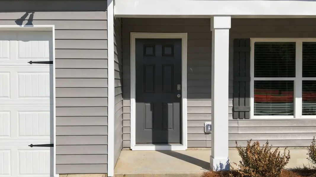 Exterior details and patio area of a home in Bynum Farms, Farmville (Image 4).