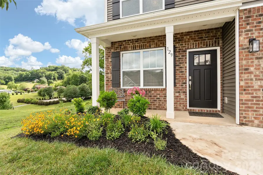 Exterior details and patio area of a home in Valleywood Farms, Waynesville (Image 24).