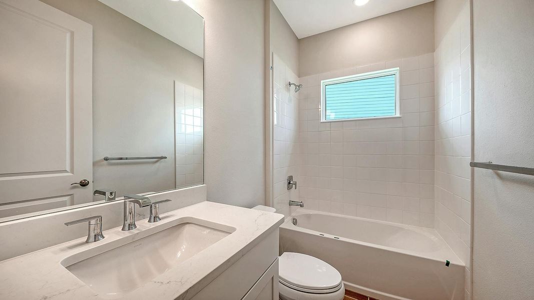 Furnished interior view inside a new home in Grand Park Real Estate and Homes for Sale in Sarasota, FL - Neal Communities, Sarasota (Image 16).