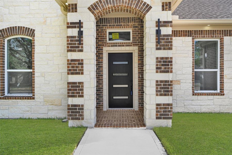 Exterior details and patio area of a home in , Baytown (Image 3).