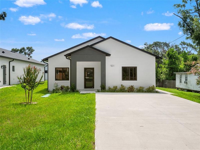 Front exterior of a new home in , Apopka, FL, highlighting curb appeal (Image 24). Front exterior of a new home in , Apopka, FL, highlighting curb appeal (Image 24).