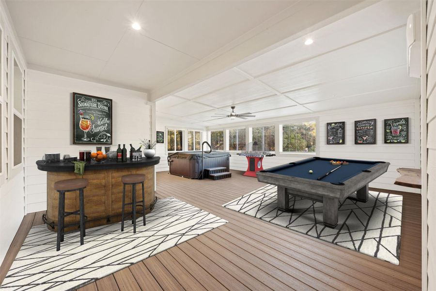 Game room featuring light wood-style flooring, a ceiling fan, pool table, a bar, and recessed lighting