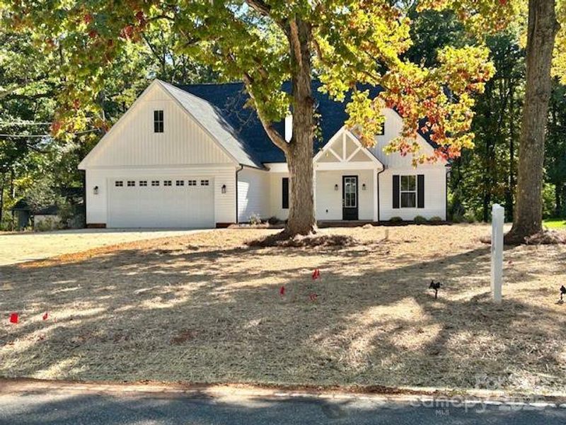 Front exterior of a new home in , Concord, NC, highlighting curb appeal (Image 2). Front exterior of a new home in , Concord, NC, highlighting curb appeal (Image 2).