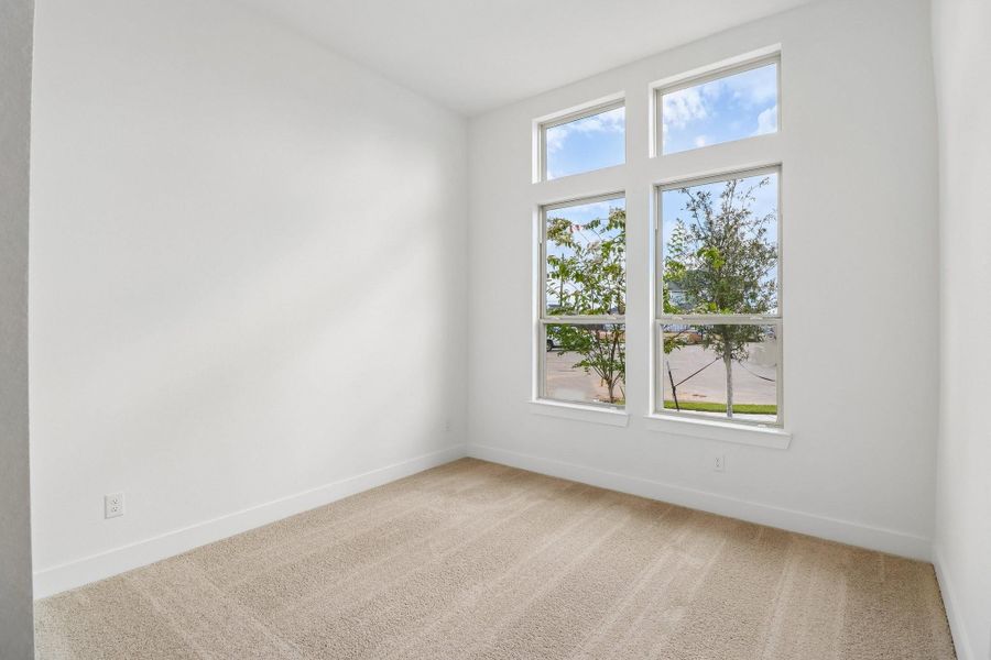 Spacious, unfurnished interior of a new home in The Grand Prairie 60', Hockley (Image 27).
