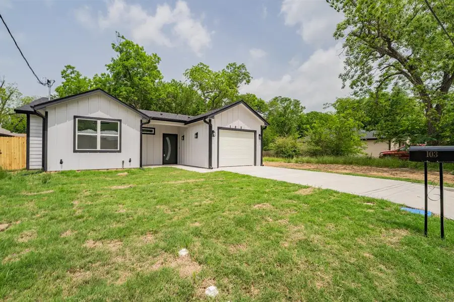 Front exterior of a new home in , Sulphur Springs, TX, highlighting curb appeal (Image 18).