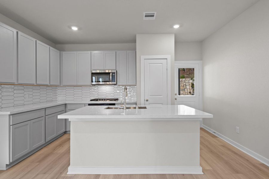 Furnished interior view inside a new home in Westridge Cove, Conroe (Image 6).