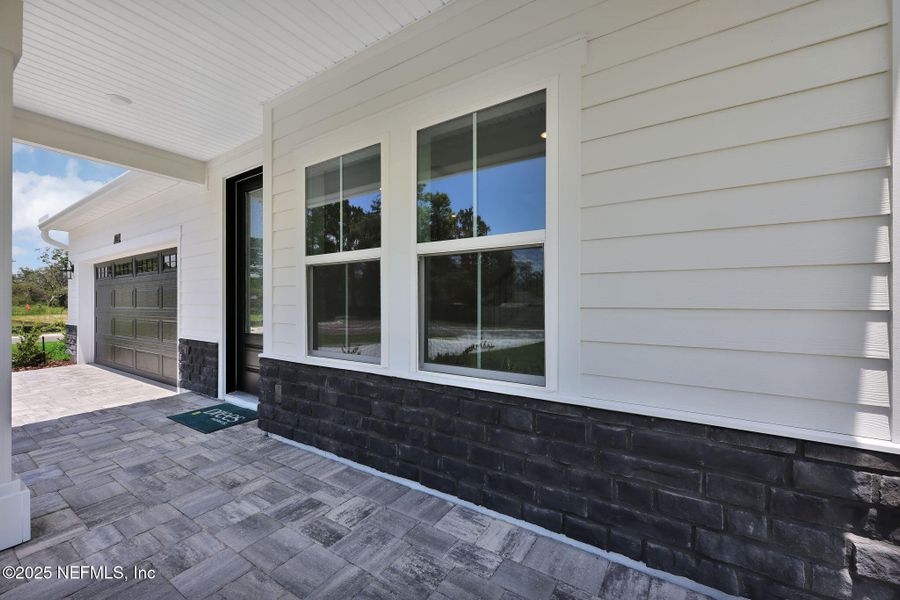 Exterior details and patio area of a home in Creighton Pointe, Fleming Island (Image 25).