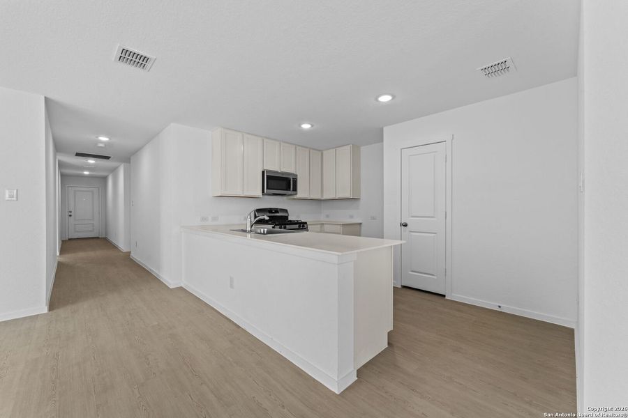 Furnished interior view inside a new home in Friendship Oaks, Fredericksburg (Image 3).