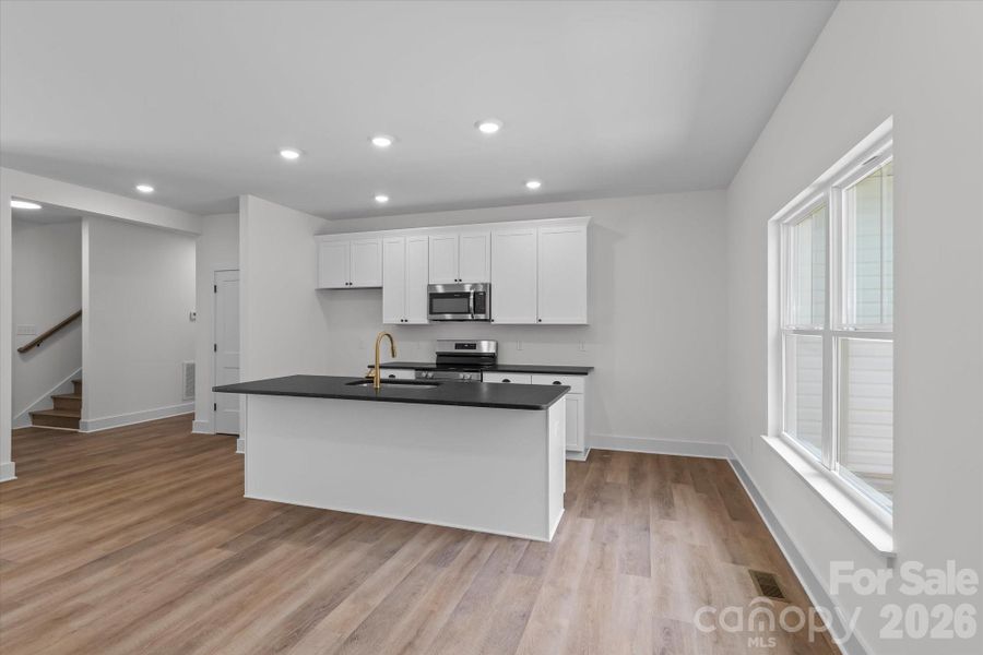 Furnished interior view inside a new home in , Troutman (Image 8).