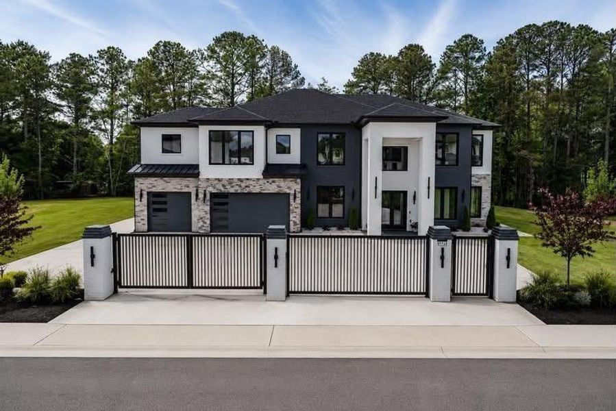 Front exterior of a new home in , Buford, GA, highlighting curb appeal (Image 28).