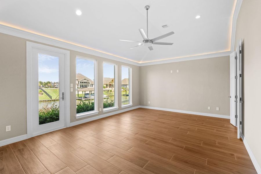 Serene primary suite designed for comfort and relaxation, featuring an airy layout and abundant natural light.