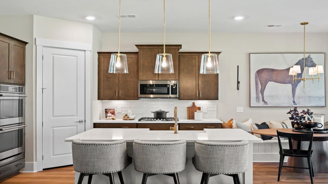 Furnished interior view inside a new home in Summerwind Crossing at Lakes of Cane Bay, Summerville (Image 4).