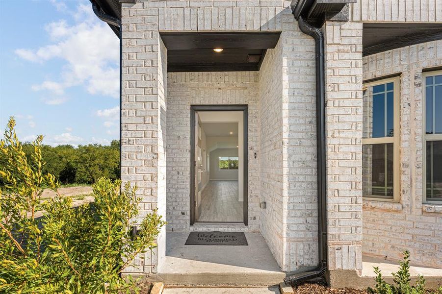 Exterior details and patio area of a home in Bear Creek Elements, Lavon (Image 3). Exterior details and patio area of a home in Bear Creek Elements, Lavon (Image 3).