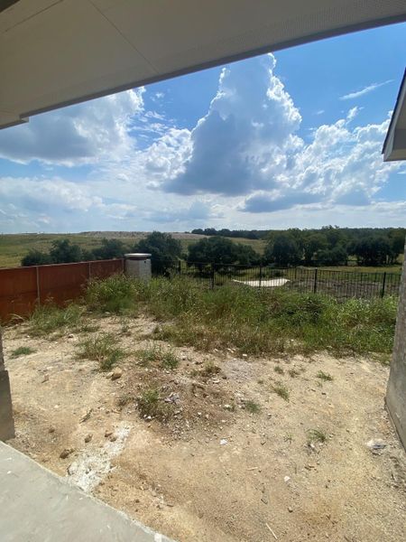 Rear Covered Patio & backyard