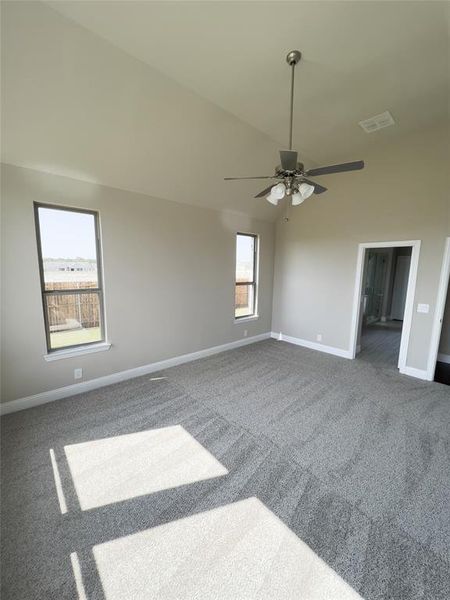 Unfurnished room with carpet floors and ceiling fan