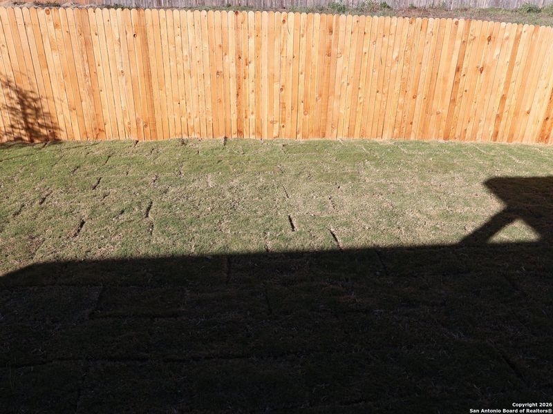 Exterior details and patio area of a home in Winding Brook, San Antonio (Image 22).