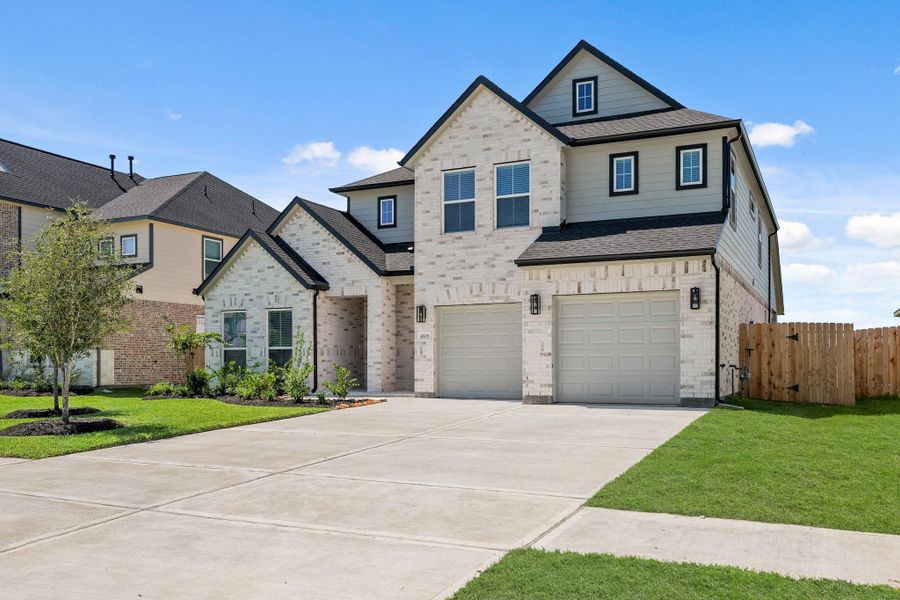 Front exterior of a new home in Briarwood Crossing, Rosenberg, TX, highlighting curb appeal (Image 17).