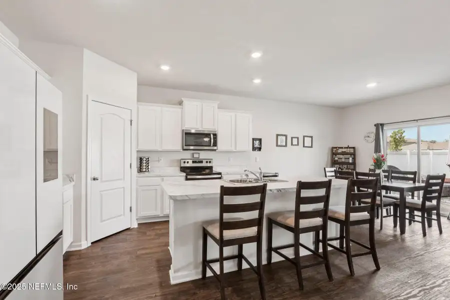 Furnished interior view inside a new home in Cross Creek Express, Green Cove Springs (Image 19).