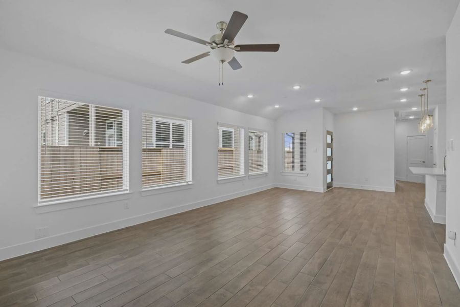 Representative unfurnished interior of a home built from the Carriagehouse by Chesmar Homes in Meridiana Townhomes, Iowa Colony (Image 85).