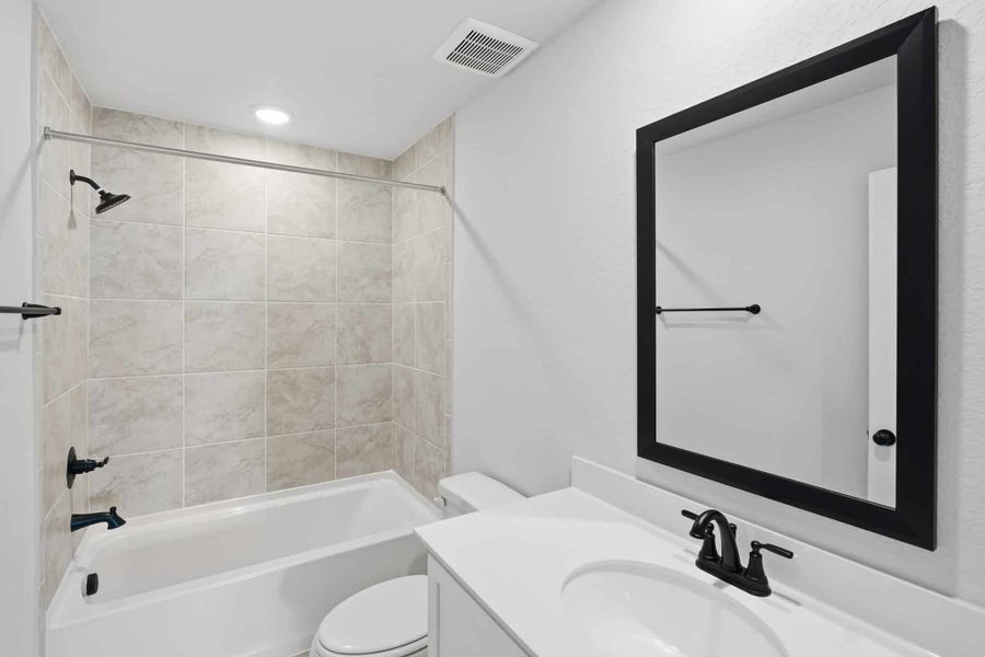 Furnished interior view inside a new home in Alsatian Oaks, Castroville (Image 18).