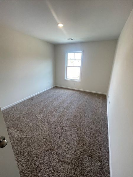 Spacious, unfurnished interior of a new home in Springwood Grove, Central (Image 23).