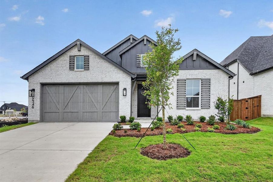 Front exterior of a new home in Sonoma Verde, McLendon-Chisholm, TX, highlighting curb appeal (Image 1). Front exterior of a new home in Sonoma Verde, McLendon-Chisholm, TX, highlighting curb appeal (Image 1).