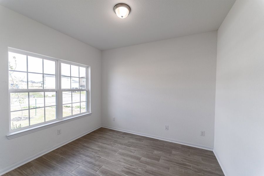 Spacious, unfurnished interior of a new home in Hunter's Ranch, San Antonio (Image 11).