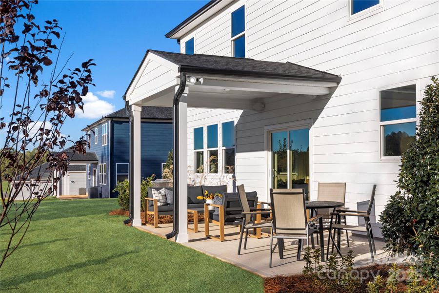 Exterior details and patio area of a home in Sheffield, Indian Trail (Image 25).