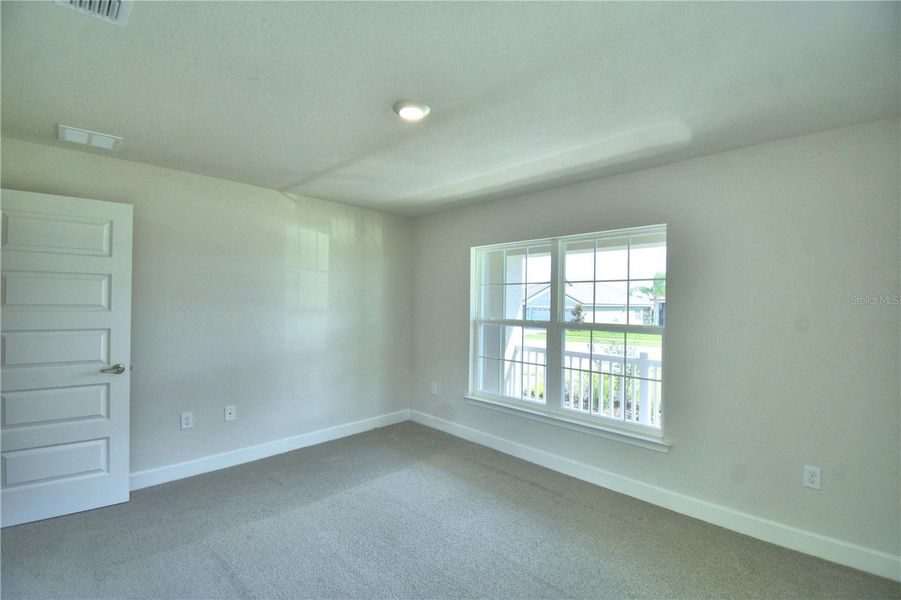 Spacious, unfurnished interior of a new home in Lake Juliana Estates, Auburndale (Image 24).