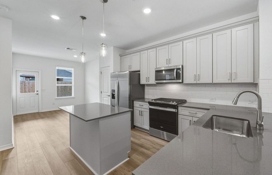 Furnished interior view inside a new home in Crosswinds, Kyle (Image 9).