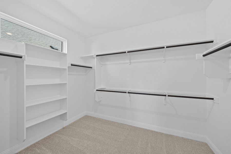 Walk-in closet in Primary Bedroom