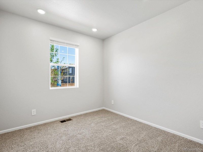 Spacious, unfurnished interior of a new home in Ridgeline Vista: The Canyon Collection, Brighton (Image 37).