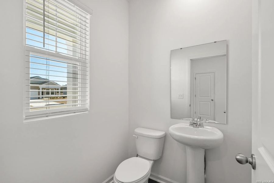 Furnished interior view inside a new home in Sutton Farms, San Antonio (Image 11).